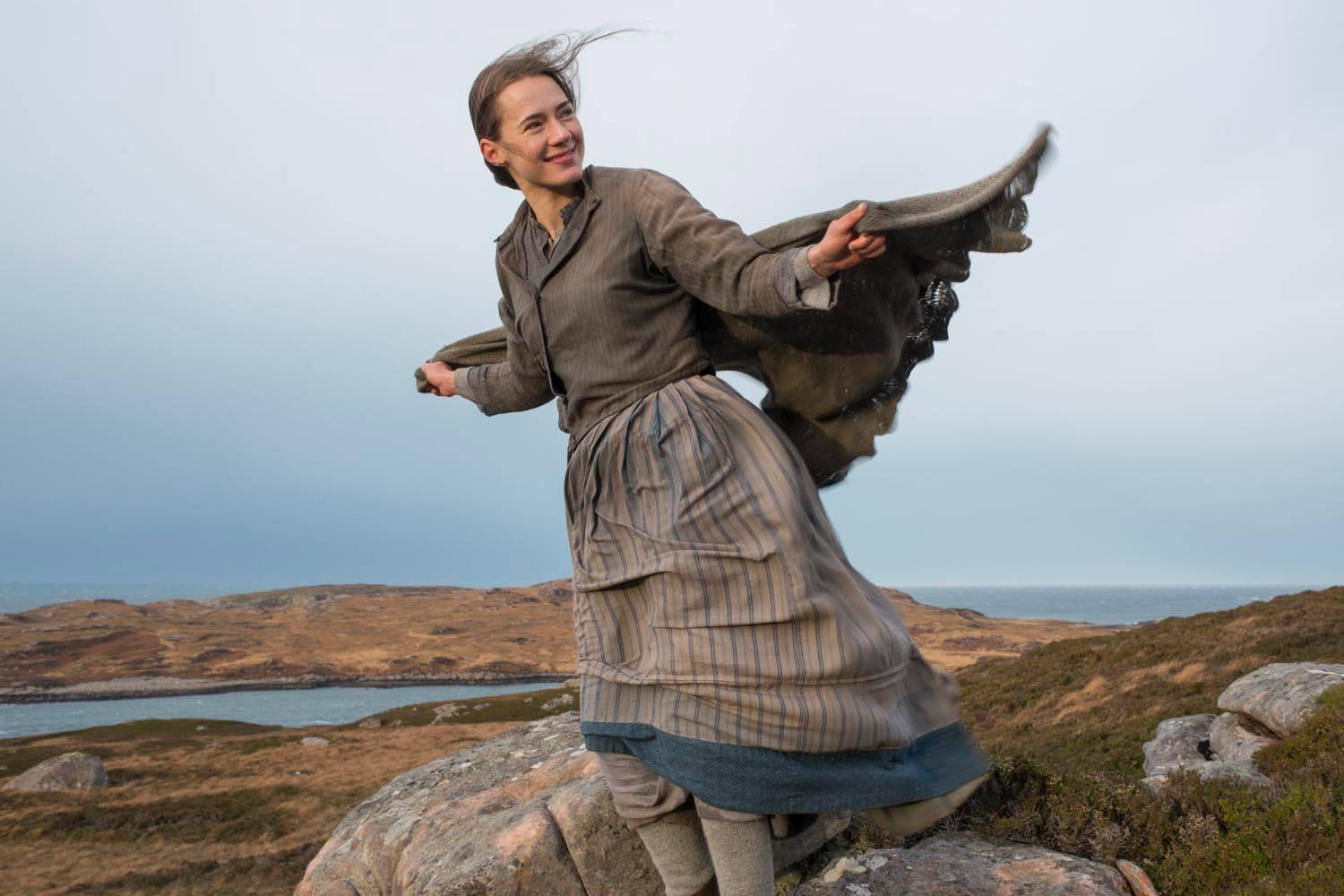 Caren Pistorius in a grey color dress with blue border posing in a Twizel.